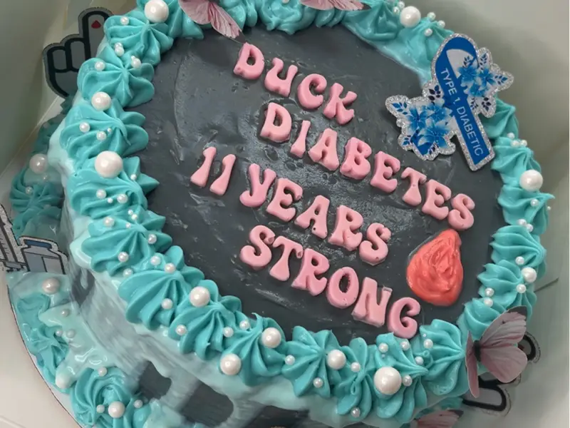 Duck-themed blue decorated cake by Diner's Choice Eats