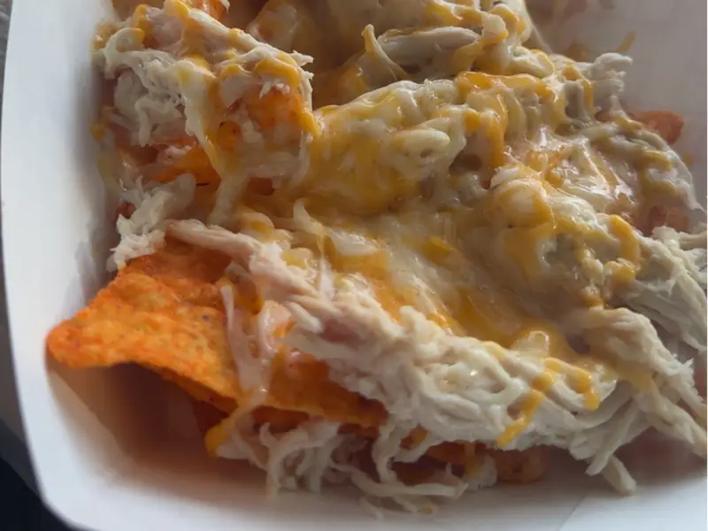 Shredded chicken Doritos bowl with cheese from Diner's Choice Eats food truck