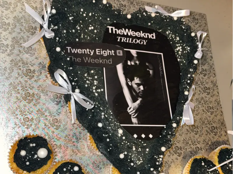 The Weeknd Trilogy heart-shaped cake with cupcakes by Diner's Choice Eats